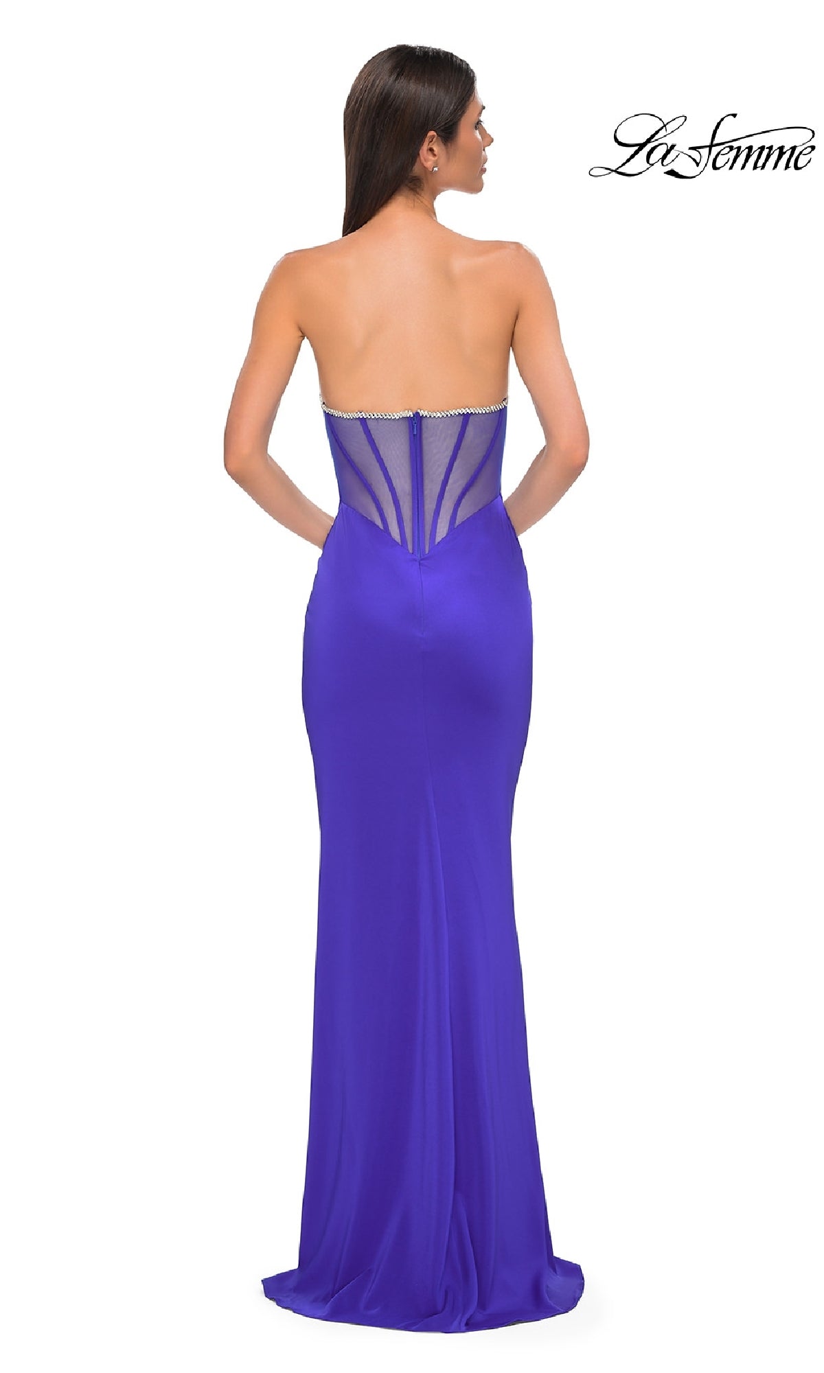 A woman wears the Bead-Trimmed Strapless Prom Dress: La Femme 32733 in royal blue, featuring a sweetheart neckline and sheer beaded back. The La Femme logo is displayed in the top right corner.